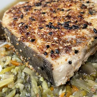 Swordfish with shredded Asian veggies.