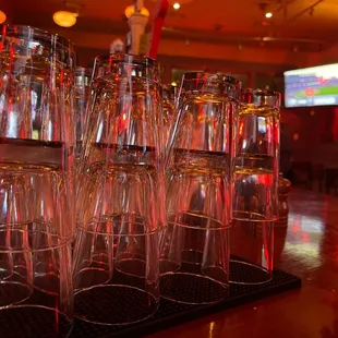 empty wine glasses on a bar
