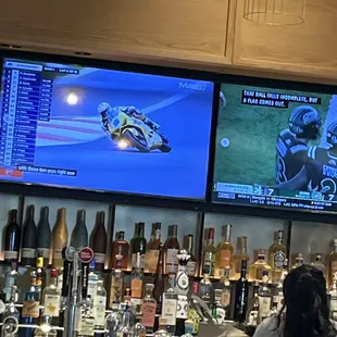 Tv screens behind the bar area