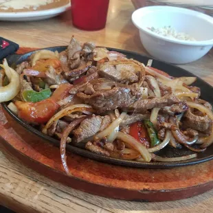 Beef fajita, ...with very few green peppers