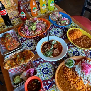 a table full of mexican food