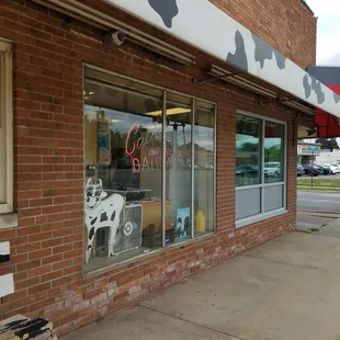 They have a cow bench and a cow awning and even a cute cow flirting with me in the window