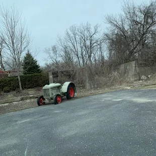 a tractor parked on the side of the road