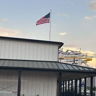 Our beautiful flag  and the zip line on the background