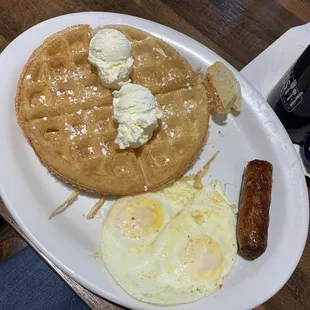 Gluten free waffle with add on of two eggs and a meat choice.