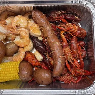 Crawfish, shrimp, sausage, corn and potatoes.