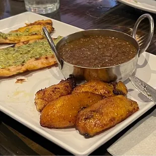 Chicken &amp; yellow rice with beans on the side. Amarillos.