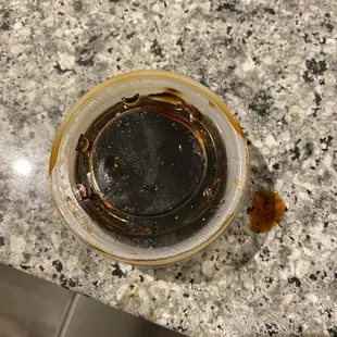 Soy sauce in a bowl marked as a soy allergy