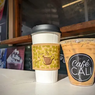 two cups of coffee on a counter