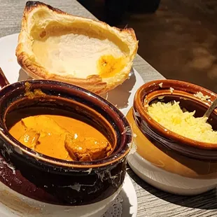 Butter Chicken Pot Pie undomed with a side of Saffron Rice