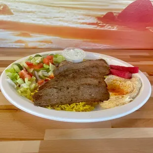 Indulge in a Mediterranean delight with our delicious Gyro Plate