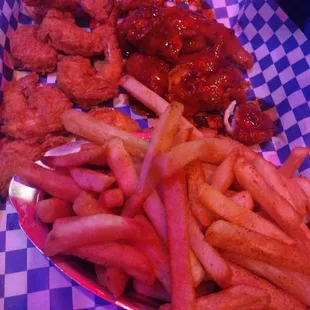 Fried shrimp, chicken wings in awesome sweet sauce &amp; fries. Lots of food!