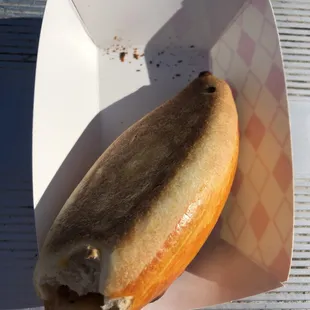 Regular chicken saltena, top bitten off