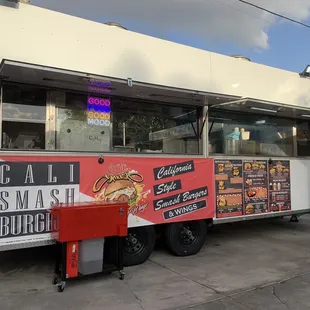 a food truck parked in a parking lot