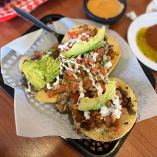 two tacos on a table