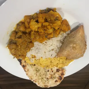 Channa Masala, Aloo Gobi, Butter Chicken, Samosa and rice