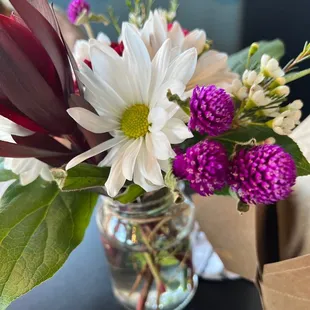 a vase of flowers on a table