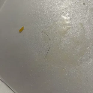 Curly hair found in Super Nachos