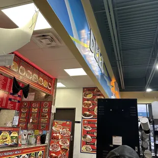 view from table, entrance/exit to gas station