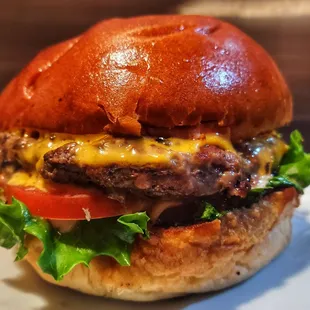 1/4 lb burger w/ American .  ($6.99 and .75cents for cheese b4 tax).