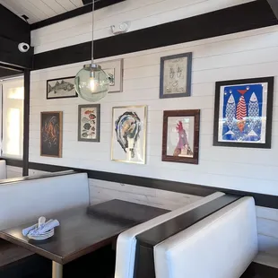 a booth with a table and chairs