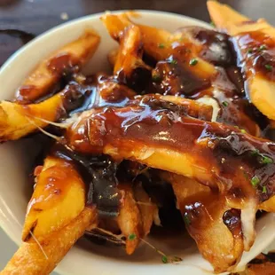 Disco Fries were actually Poutine! Here they are with extra gravy as they should have been in the first place. Delicious!