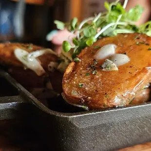 a pan of baked potatoes