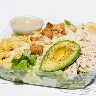 a salad in a plastic container