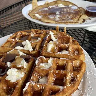 a plate of waffles on a table