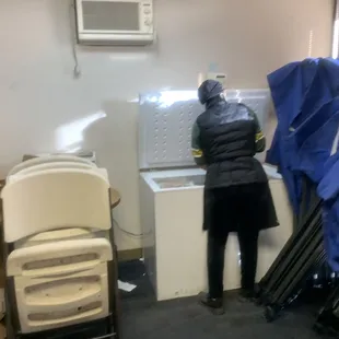 a woman working in a kitchen