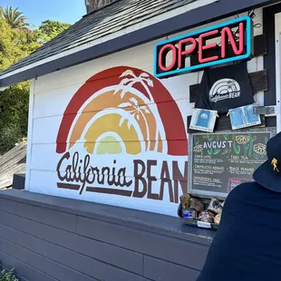 a man standing in front of a store