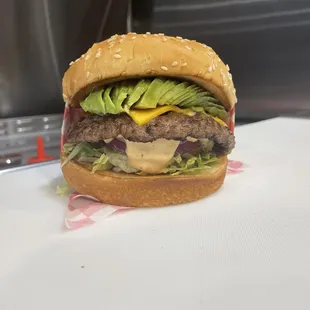 This right here is our Avacado Burger W/cheese to be exact our #5 on the menu