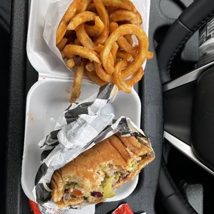 Bacon avocado burger and medium curly fry