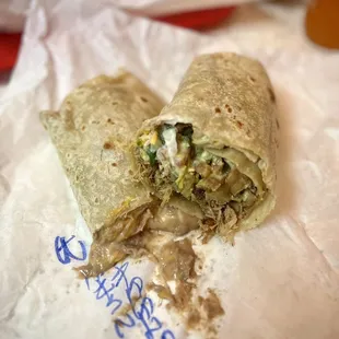 Half of a California Burrito and half of a bean and cheese burrito