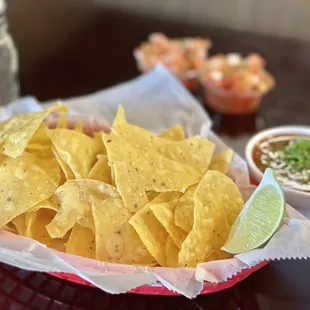 Chips, Red Salsa with a splash of Green Salsa! Delish!