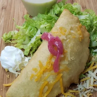 From our ancestors.  Empanada