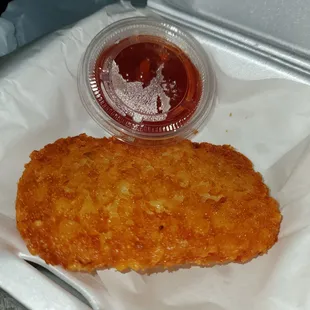 Crispy perfectly cooked Hashbrown- no oil taste side of ketchup much appreciated
