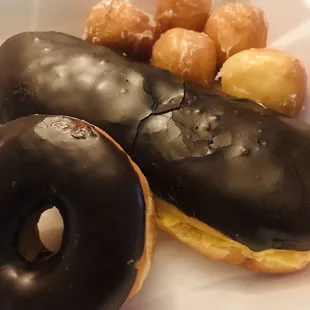 Cream filled chocolate bar, regular chocolate glazed, and doughnut holes. Yum!