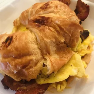 Breakfast Croissant with bacon, sausage, egg and cheddar cheese. No mayo.