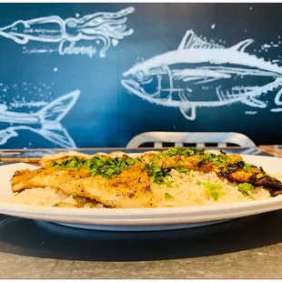 Salmon and Swai + diced zucchini + buttered grilled shrimps.