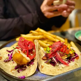 Two Taco plate w/ BATTERED FISH TACO &amp; CAJUN SALMON TACO. My wife doesn't like the sweet grilled corn in it, but I like it.