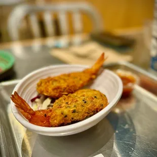 COCONUT SHRIMP added on as a side for $3.95. It's good, but the sauce that comes with it is AMAZING!!