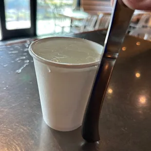 Tiny cup for free water.