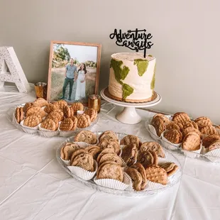 Baby shower cake! Adventure themed! So cute! Also the peanut butter cookies and chocolate chip cookies are just incredible.