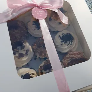 a box of cupcakes on a table