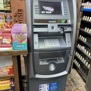 an atm machine in a grocery store