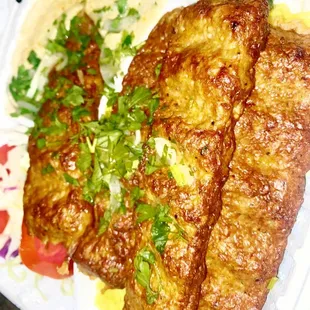 Great Beef Kebabs and rice , hummus