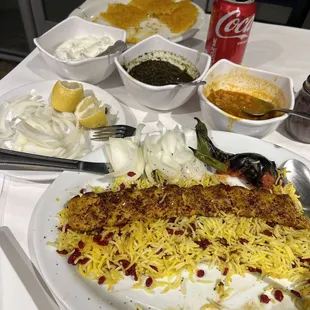 Chixken koobideh combo  Tadik (crunchy rice) with stew on the side  Side of mast o moosir (yougart and shallots)