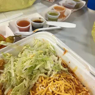 4. Two Enchiladas combo, and a small buffet of sauces