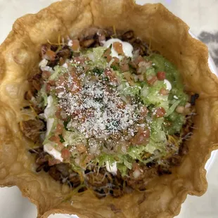 a close up of a taco salad